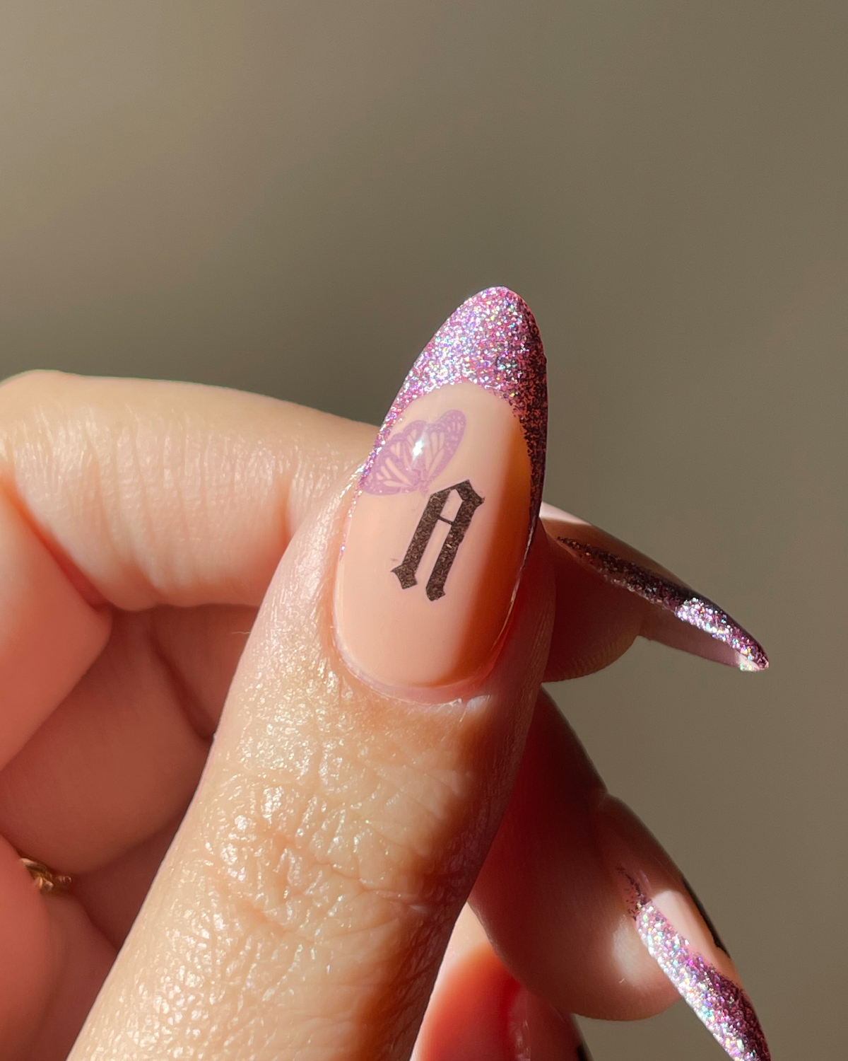 Metamorphosis Nail Tattoos